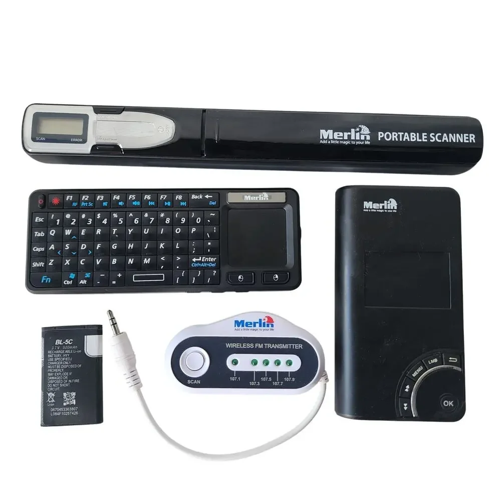 Four Merlin gadgets portable scanner keyboard projector amfm transmitter